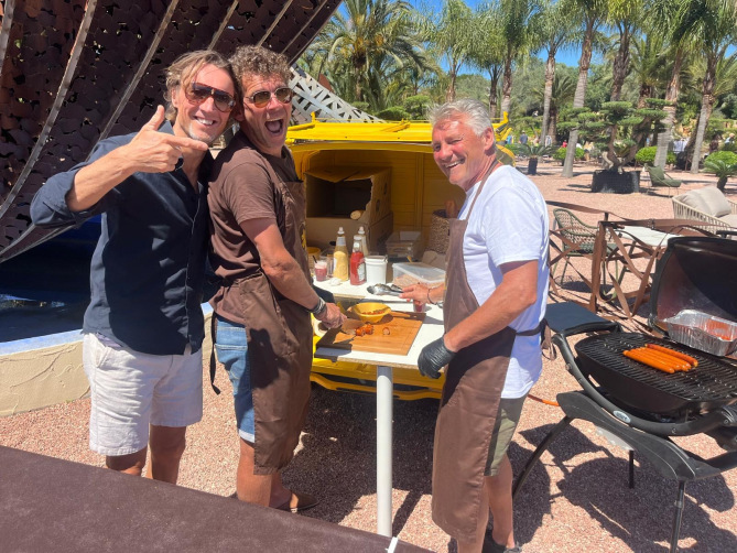 Guests enjoying hotdogs at a Costa Blanca festival