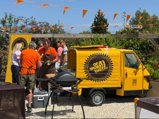 Serving Texas-style hotdogs to guests